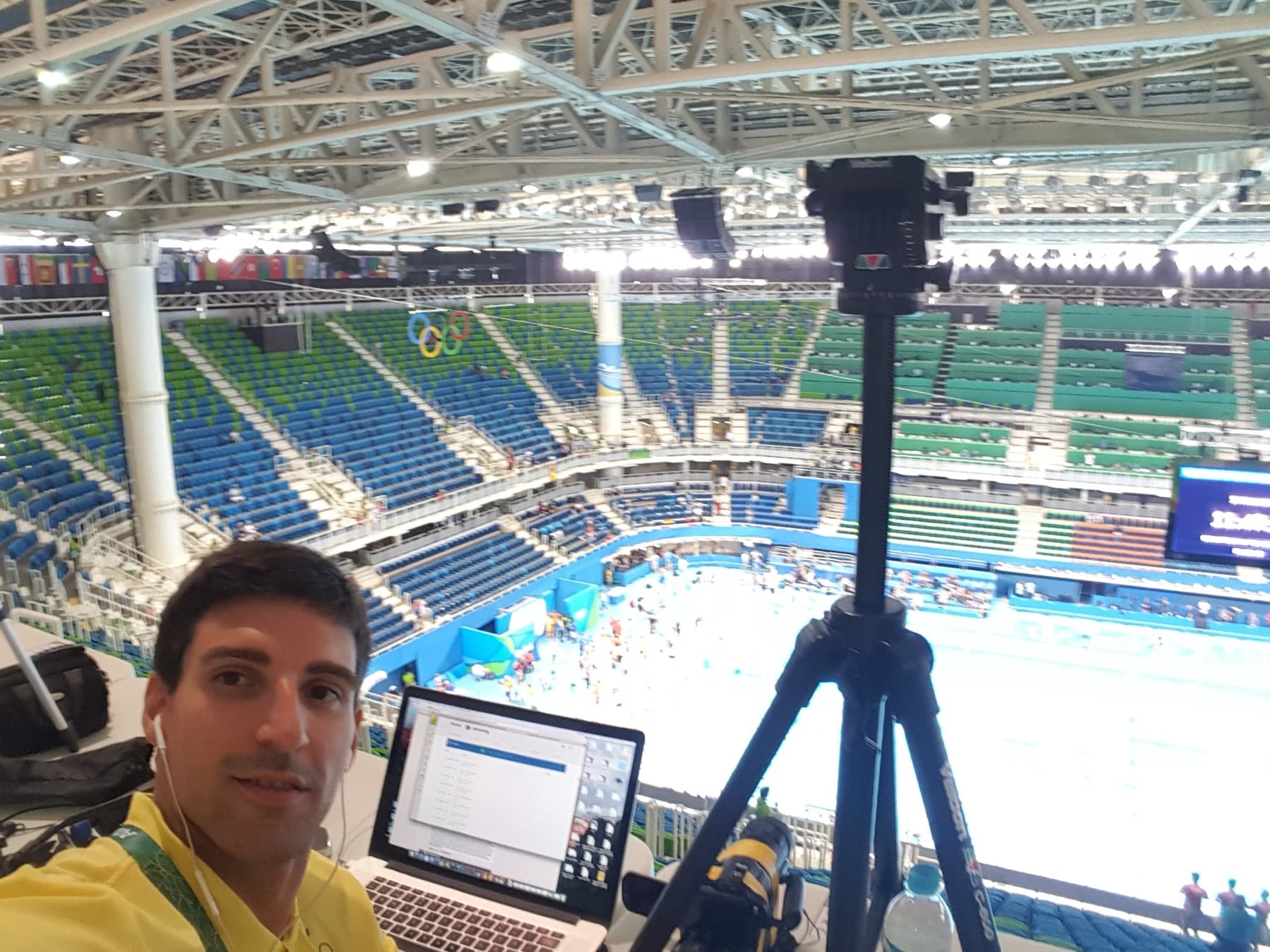 Race-analysis station with a camera rig overlooking the Olympic pool, Rio 2016.